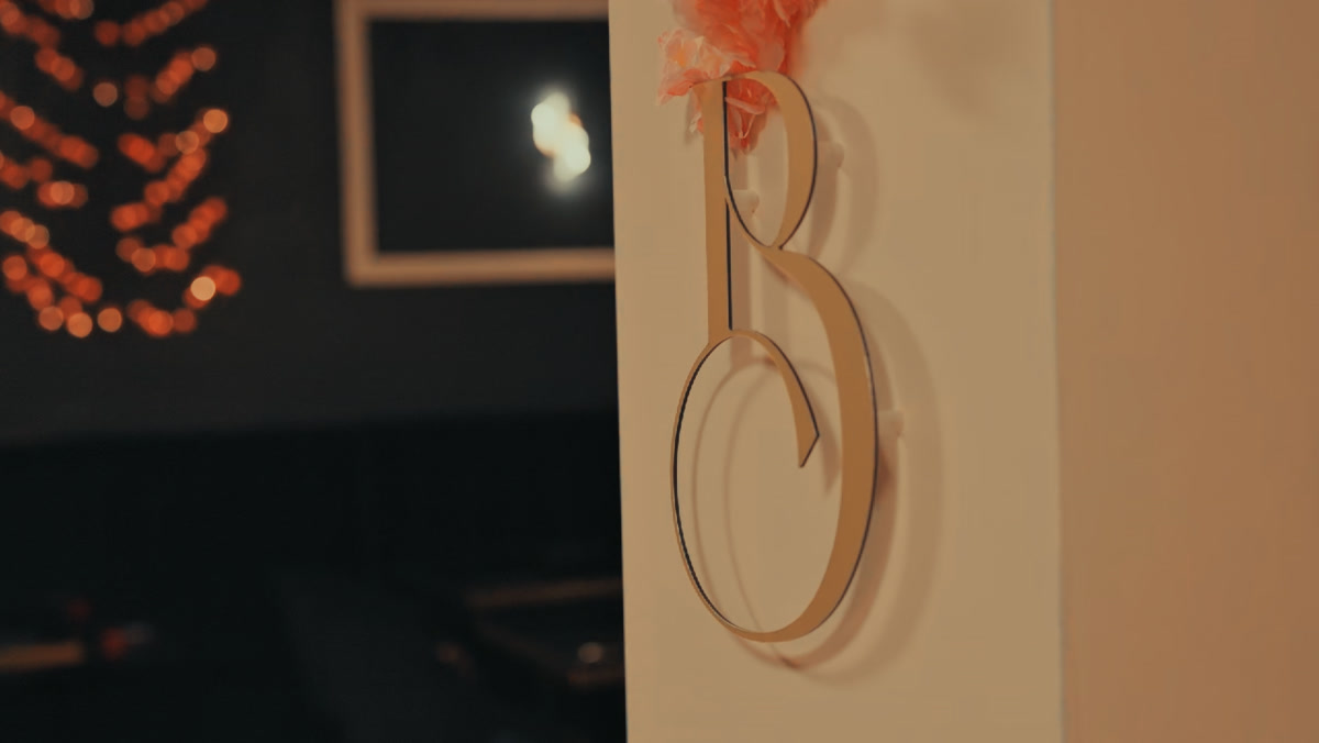 The Bastian "B" branding mounted on the wall